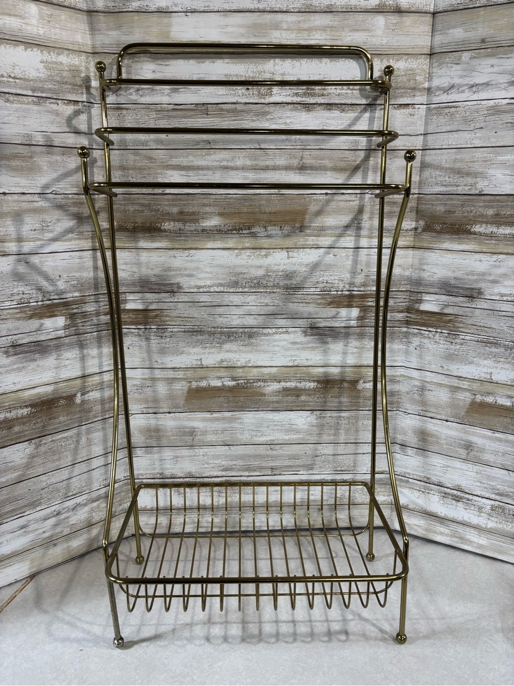 Large vintage brass-coloured metal bathroom storage rack